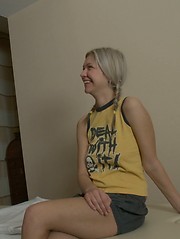 Smiling babe yields to a masseur
