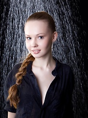 Virginia Sun looks adorable and sexy, wearing matching black dress and lace stockings, and her angelic, youthful appeal. 