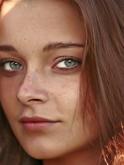 Indiana is a wild girl with a beautiful ass and dazzling eyes, she is playing in the garden.