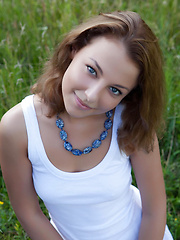 Even in the outdoors, wearing a casual flowing dress, Nikia proves she has great potential to seduce anyone anywhere anytime, with a gorgeous slender body and enticing smile.