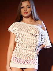 An erotic view of Alyssa in a sexy fishet shirt, hot lingerie panty and sensual, provocative poses.