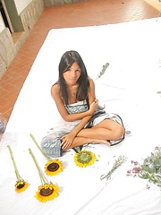 Karla Spice wears nothing but flowers over her naked body