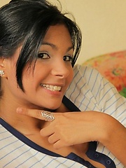 Karla is wearing her sexy stripes outfit and bears down to just a thong