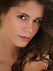 Sultry sizzler Caprice entertains her   fans with a sensual striptease before   hitting the sheets, showcasing her   slender body with delicate assets.