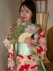 This young Geisha gives a good service to her foreign guest