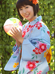 Rio Matsushita Asian shows sexy legs under geisha dress outdoor