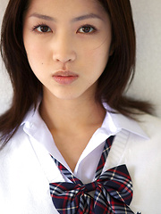 Azusa Togashi Asian undresses uniform to show behind in panty