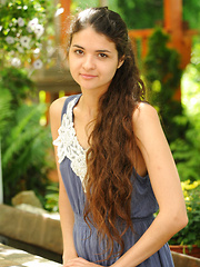 Connie portrays a sweet and cute garden nymph with her long, wavy brown hair, naturally beautiful face without any hint of makeup, and an exquisite body with womanly curves.