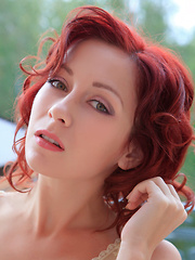 Night A's pink, shaven pussy and svelte legs claim the highlight in this morning shoot by the veranda with Rylsky.
