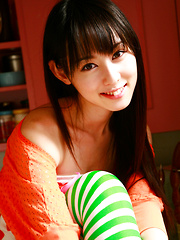 Rina Akiyama Asian in long colorful socks enjoys some sweets